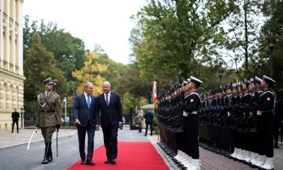 Stocker and Tusk handshake