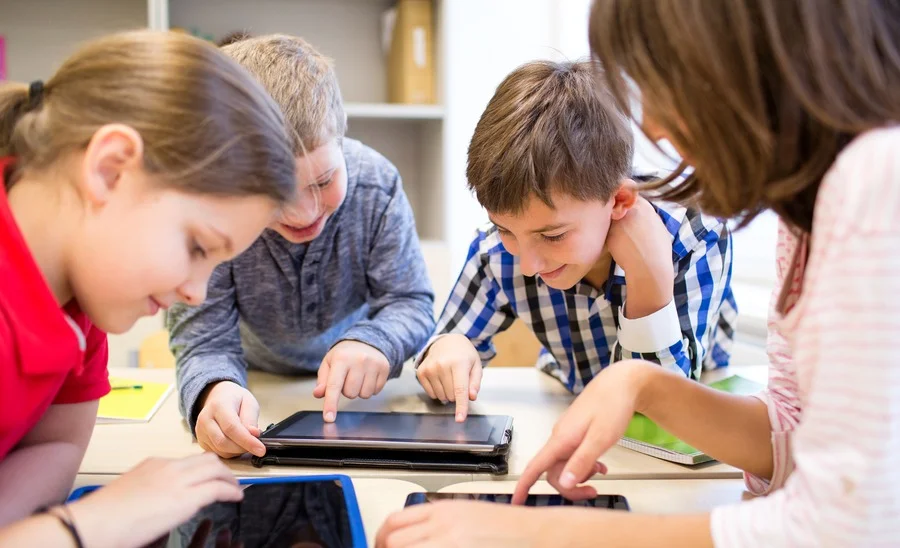 Teacher in classroom with students